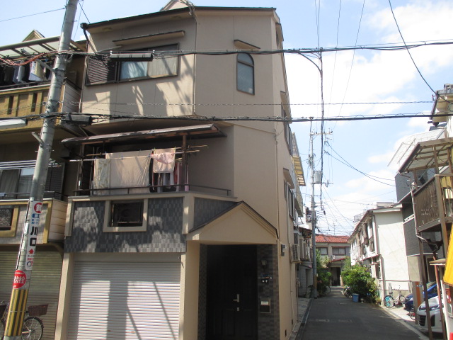 大阪府守口市藤田町　Ｔ様　外壁・屋根ガイナ塗装リフォーム施工事例
